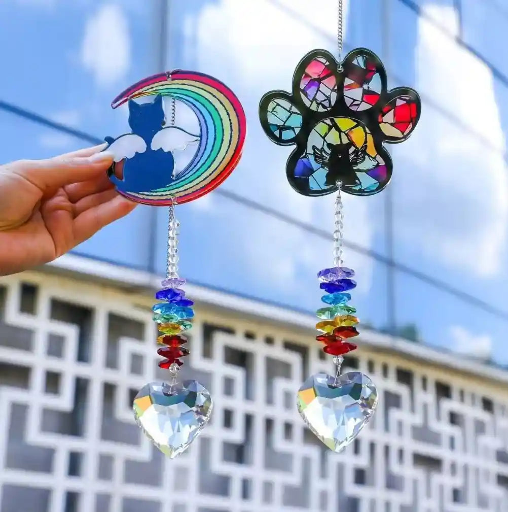 Paw print pet memorial crystal suncatcher with colorful stained-glass-style acrylic top and heart-shaped prism