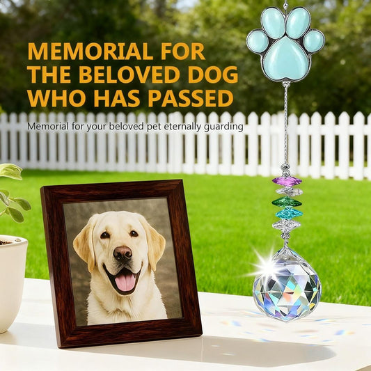 Blue paw print memorial suncatcher with 40mm clear crystal prism hanging in window