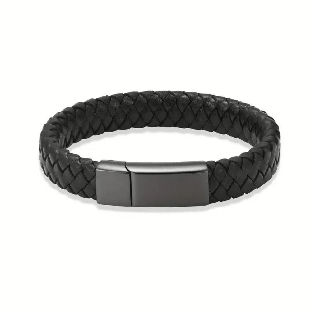 Close-up view of a premium black braided genuine leather pet memorial urn bracelet for ashes featuring a distinctly bold masculine black stainless steel interlocking clasp.