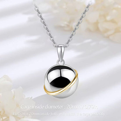 Lifestyle image with text overlay
Planet memorial urn necklace worn on chain, discreet keepsake pendant for pet remembrance
