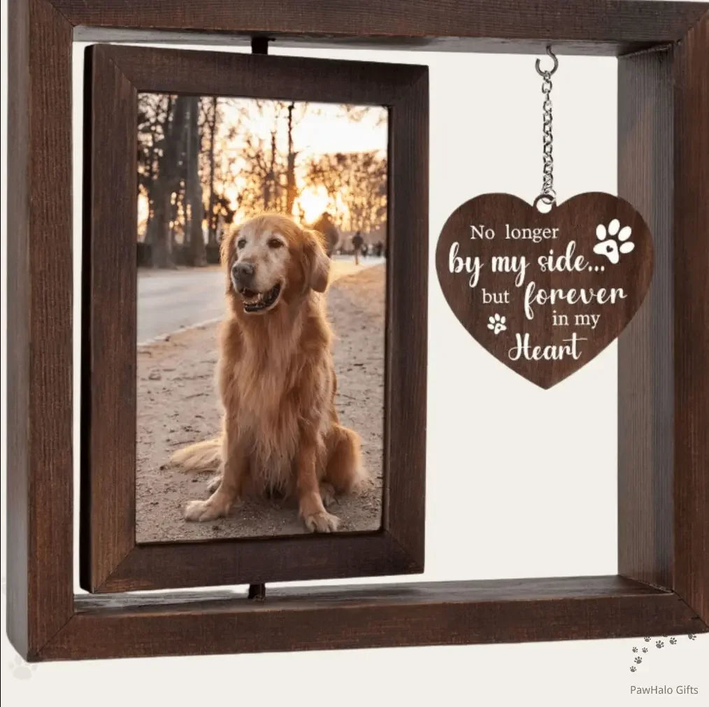 Demonstrating the 360-degree rotating feature of the wooden pet loss photo frame to easily display two different pictures.