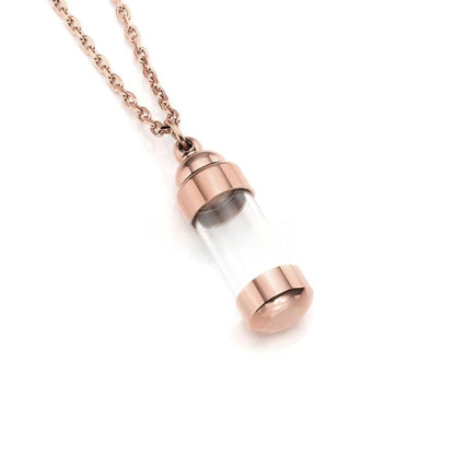 Clear glass tube stainless steel memorial pendant necklace shown in rose gold finish, minimal keepsake design