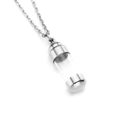 Clear glass tube stainless steel memorial pendant necklace shown in silver finish, minimal keepsake design