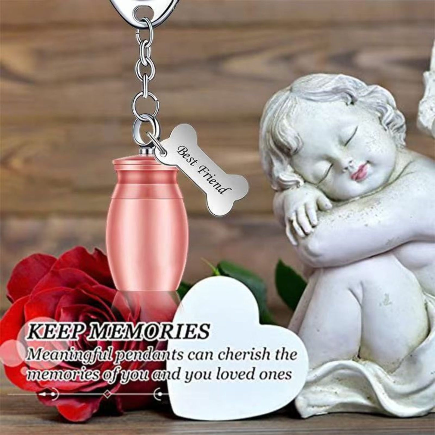 Rose gold pet memorial urn keychain lifestyle photo with angel figurine and rose, featuring Best Friend bone charm.