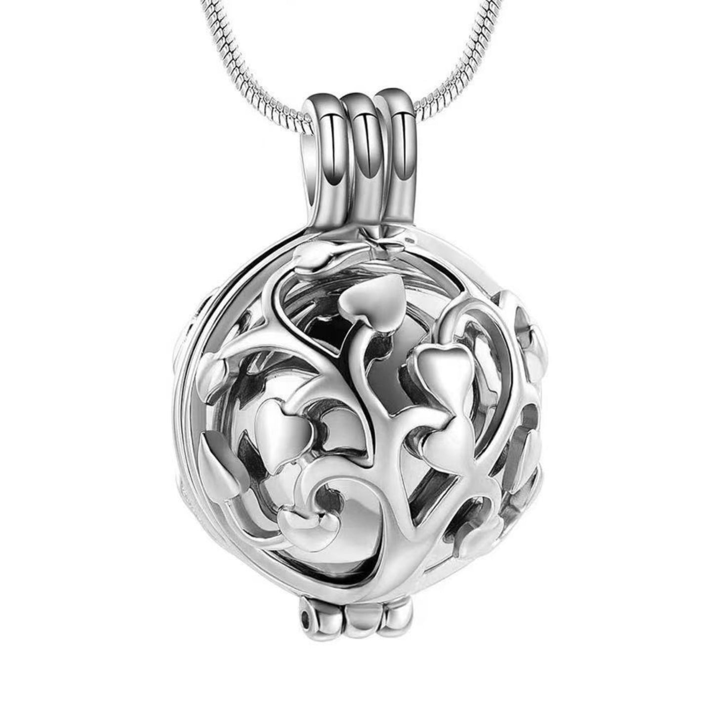 Close-up of silver inner sphere Tree of Life hollow memorial pendant necklace on chain