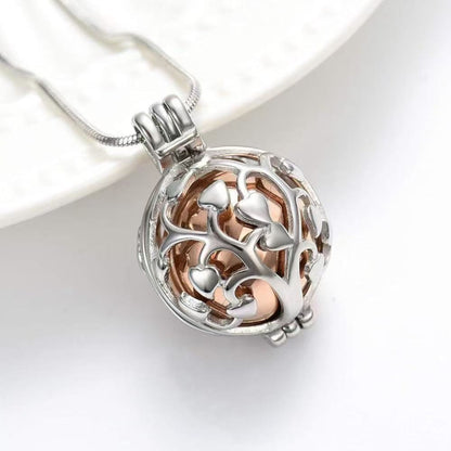 Tree of Life urn necklace displayed open with inner keepsake container parts on a white background