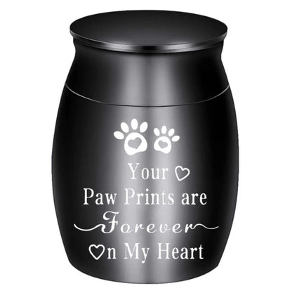Isolated front view of the silver memorial urns for pets engraved with a heart, paw prints, and forever on my heart text.