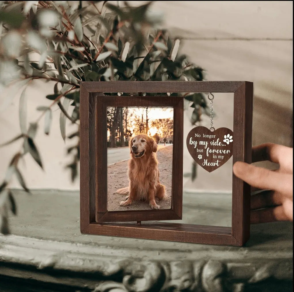 A personalized dog memorial picture frame placed beautifully on a living room shelf as a comforting home decor tribute.