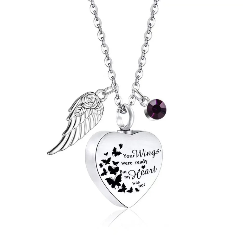 Purple February birthstone heart pet memorial urn necklace on a silver chain.