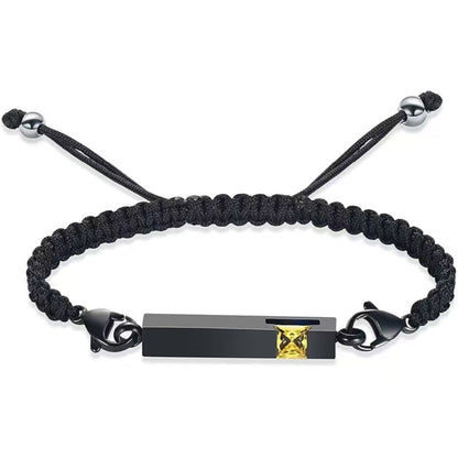 Black braided urn bracelet with golden yellow birthstone accent, stainless steel cremation keepsake bracelet for ashes