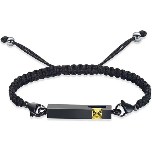Black braided urn bracelet with golden yellow birthstone accent, stainless steel cremation keepsake bracelet for ashes