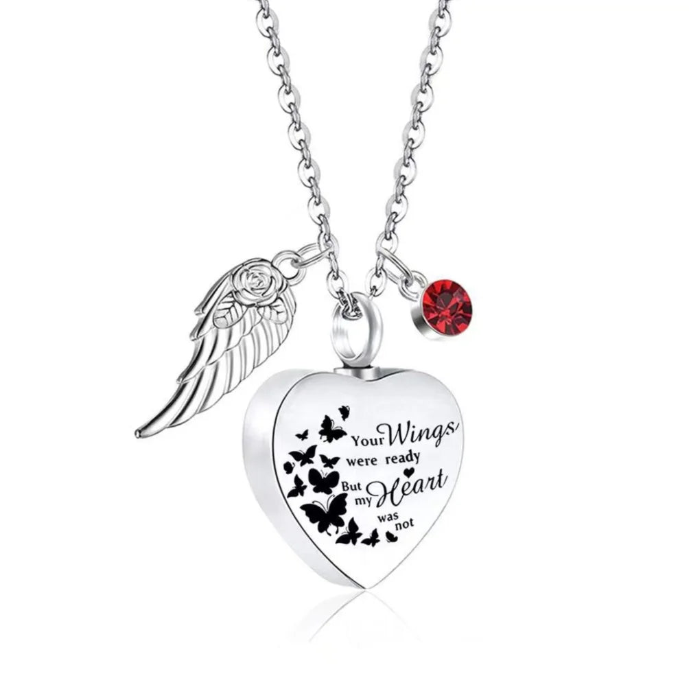 Red January garnet birthstone heart pet memorial urn necklace on a silver chain.
