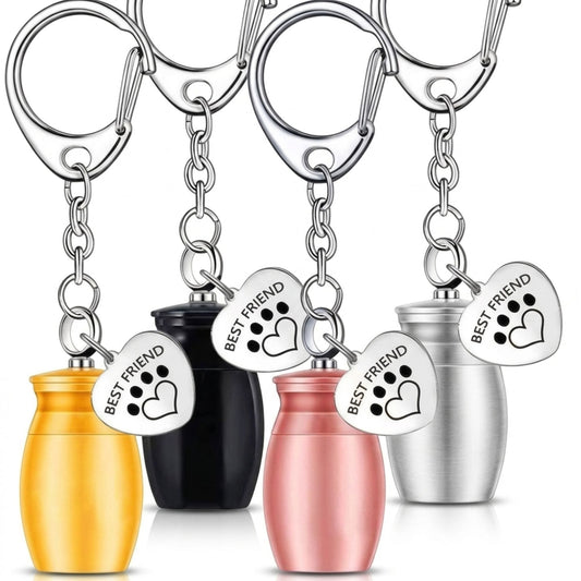 "Multi-color Pet Memorial Keychain Set featuring gold, black, rose gold, and silver urn designs with 'BEST FRIEND' tags and paw print charms"