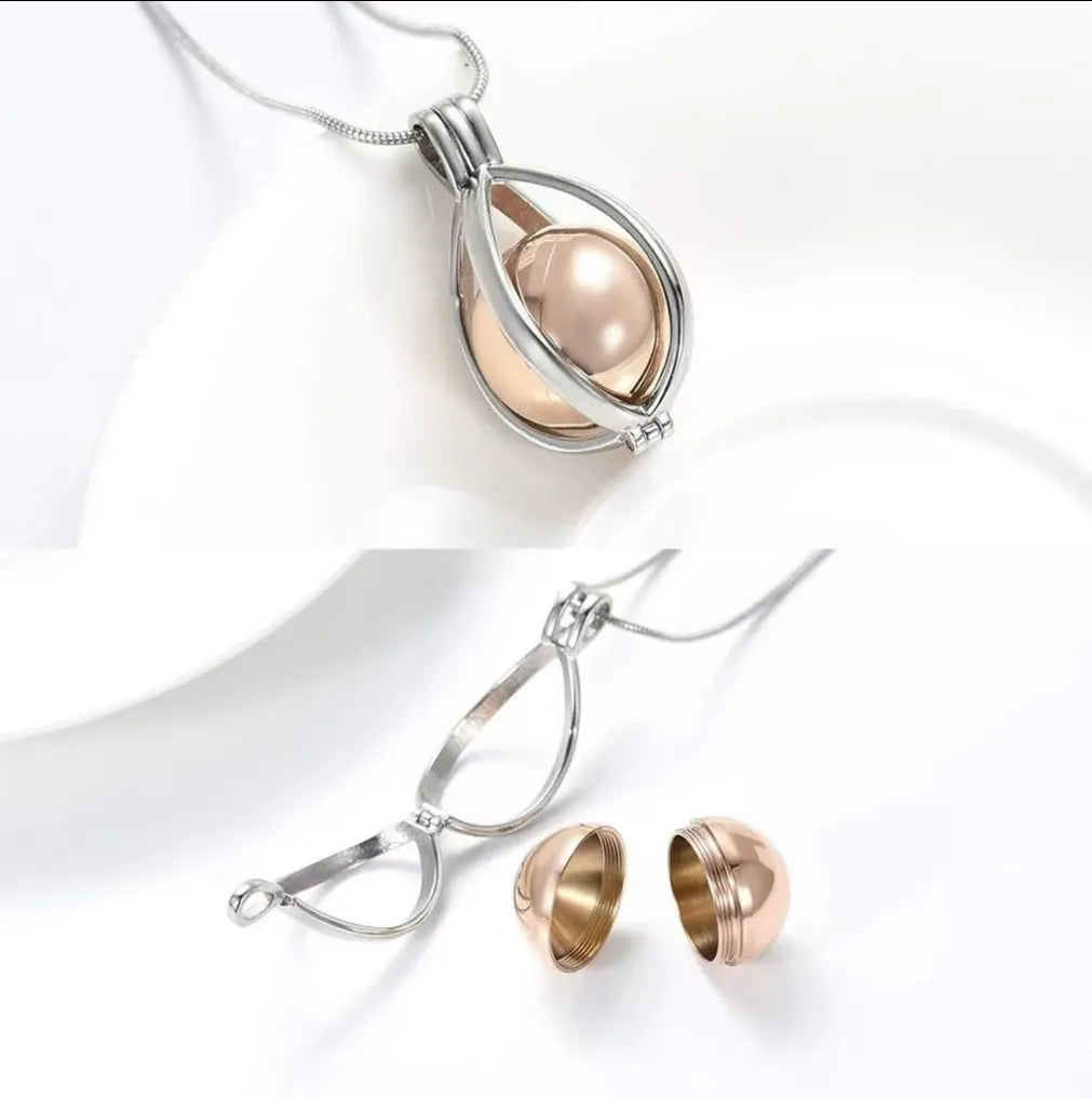 Openable teardrop cremation urn pendant necklace showing screw-top keepsake container for ashes, fur or hair