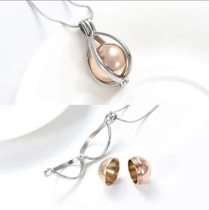 Openable teardrop cremation urn pendant necklace showing screw-top keepsake container for ashes, fur or hair