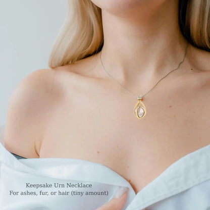 Woman wearing stainless steel teardrop urn necklace pendant for pet ashes, keepsake cremation jewelry
