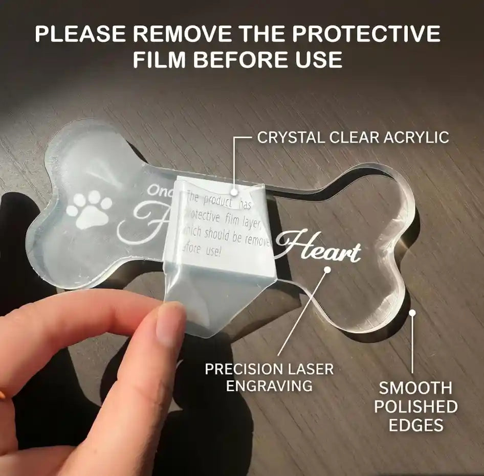 Peeling off the protective paper layer from the acrylic pet memorial plaque.