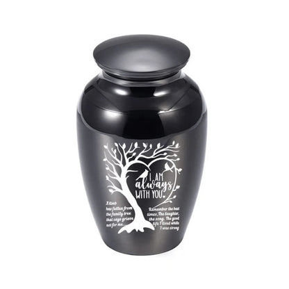 Isolated front view of the premium black stainless steel medium pet urn engraved with a heart shaped tree and birds.