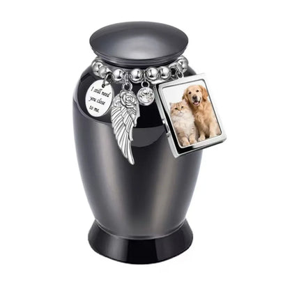Isolated front view of the light blue personalized pet urn decorated with an emotional poetry medallion and photo frame.