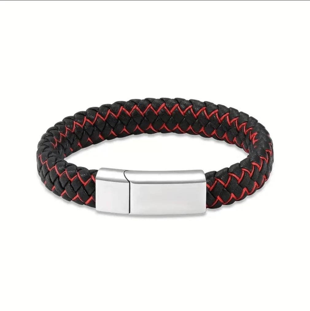 Close-up view of a premium black braided genuine leather pet memorial urn bracelet for ashes featuring a distinctly bold masculine black red stainless steel interlocking clasp.