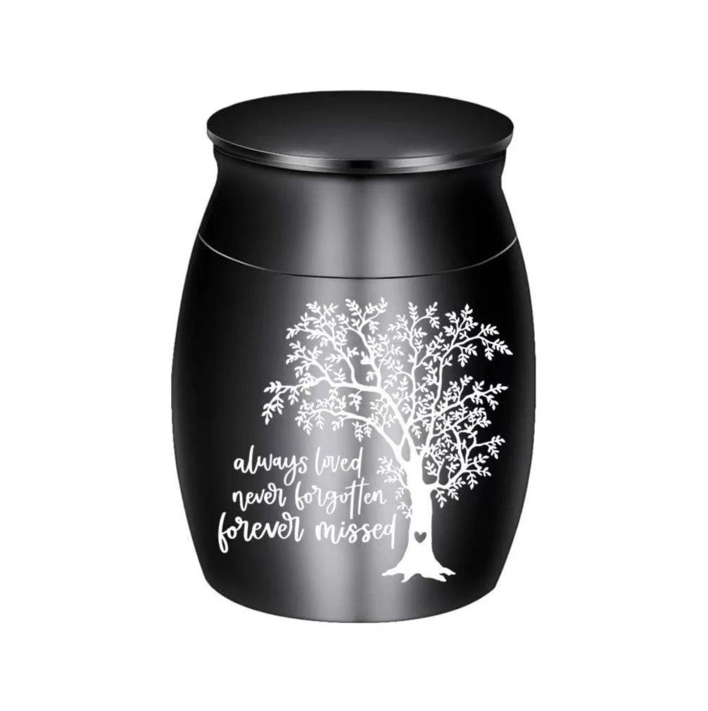 Isolated front view of the pink gold memorial urns for pets engraved with a heart shaped tree of life.