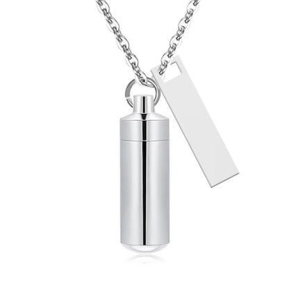 Silver alloy capsule pet urn necklace with matching black tag on silver chain front view