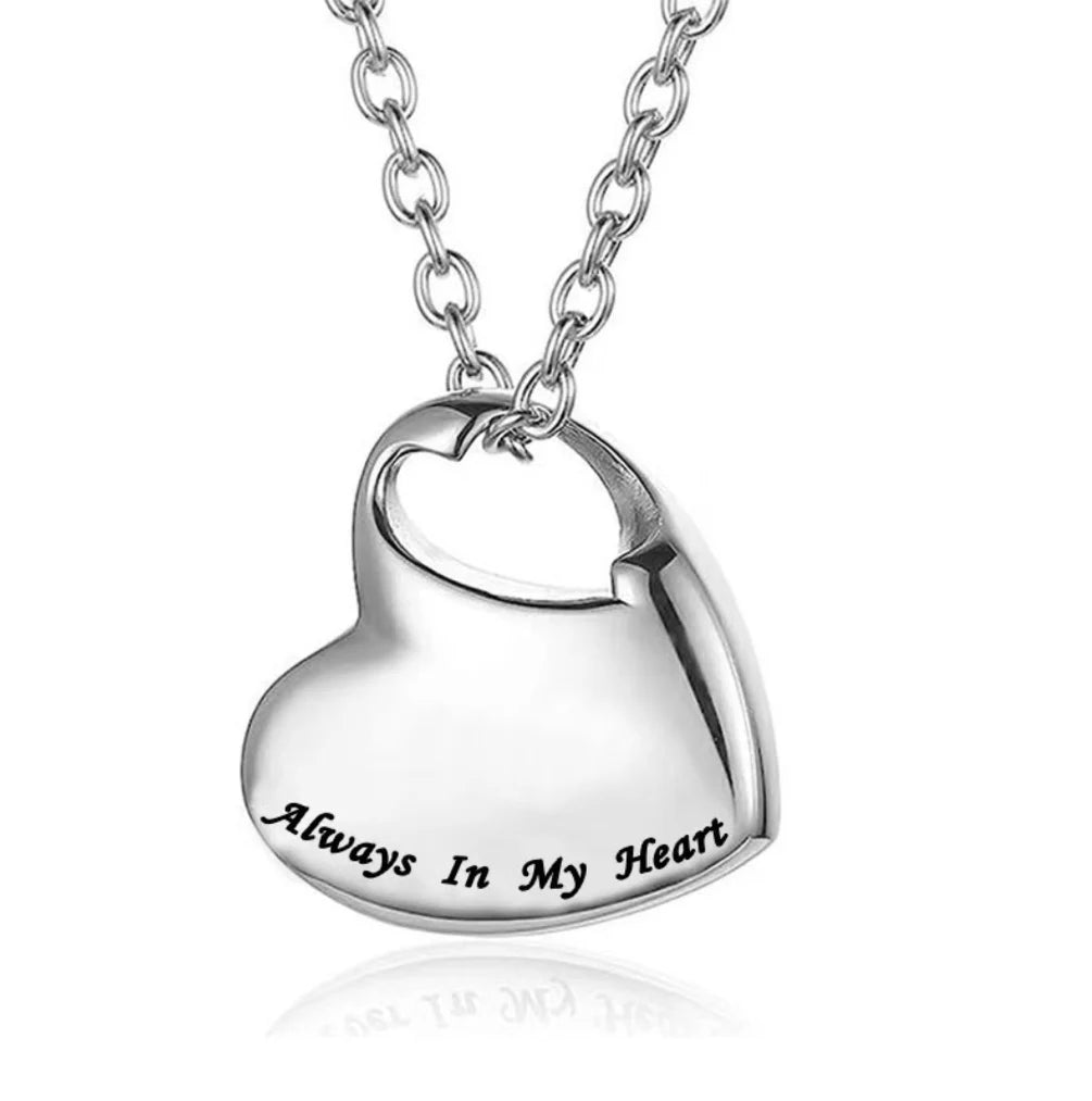 Front close-up view of the polished silver always in my heart ashes necklace made of medical-grade 316L steel.