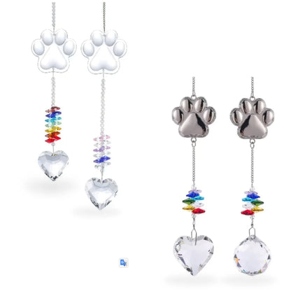 Four style variants of the dog paw crystal prism suncatcher showing heart and ball prisms.