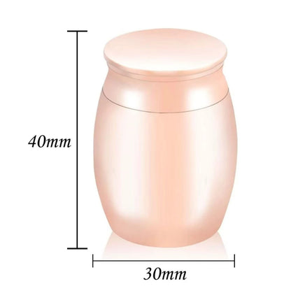 Size specifications of the miniature dog urns for ashes measuring 40mm in height and 30mm in width.