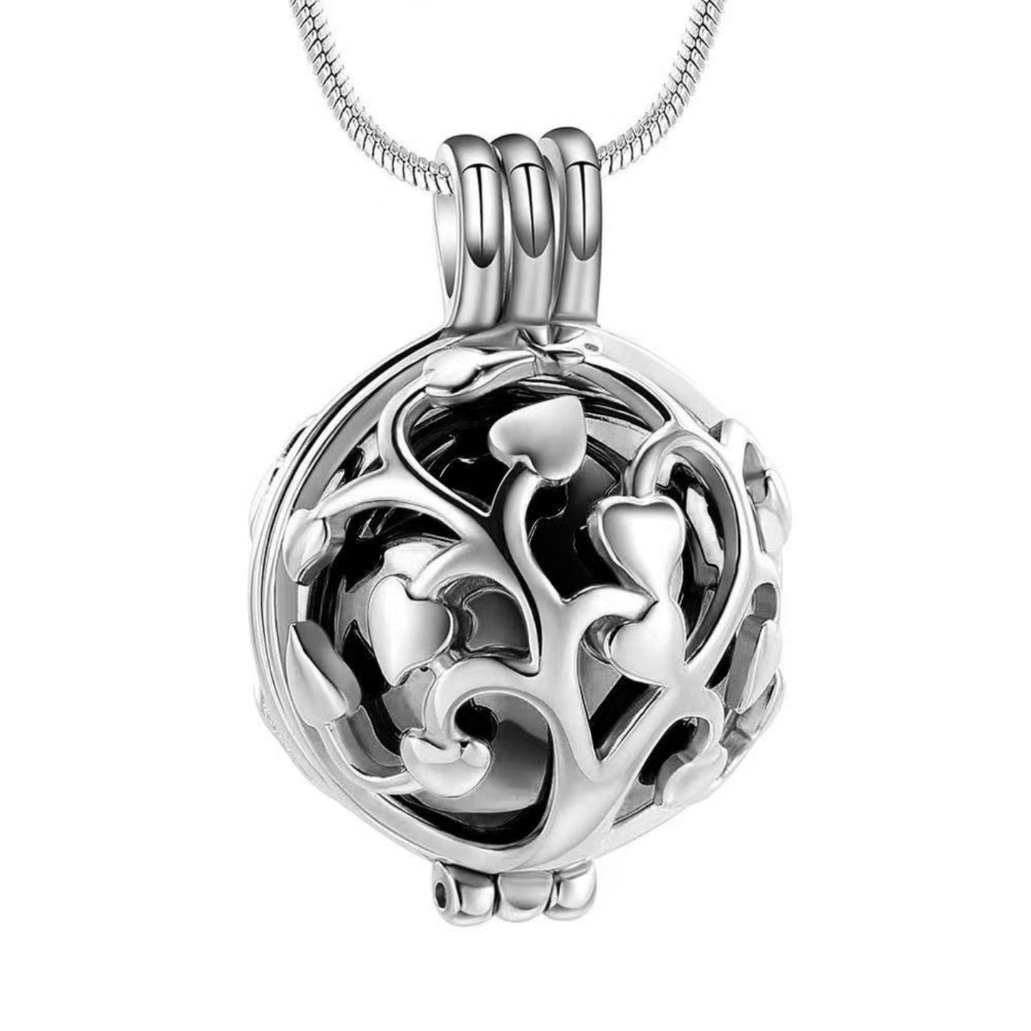 Close-up of black inner sphere Tree of Life hollow memorial pendant necklace on chain
