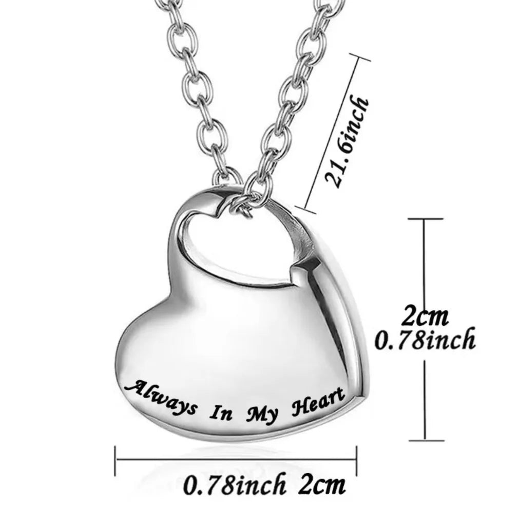 Size specifications of the heart-shaped cremation pendant measuring 0.78 by 0.78 inches with a 21.6 inches link chain.