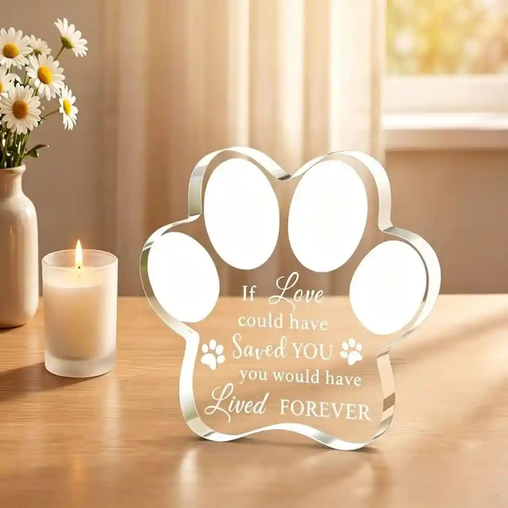 Close-up of the acrylic paw plaque showing the love could have saved you poem.