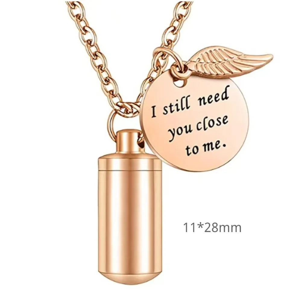 Medium 28mm variant of the rose gold aromatherapy pet urn cylinder bar with engraved round medal.