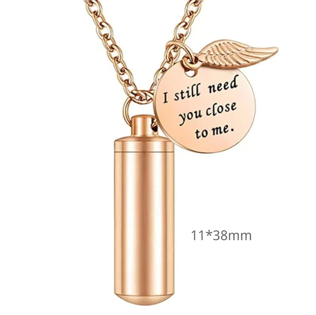 Medium 38mm variant of the rose gold aromatherapy pet urn cylinder bar with engraved round medal.