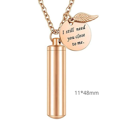 Medium 48mm variant of the rose gold aromatherapy pet urn cylinder bar with engraved round medal.