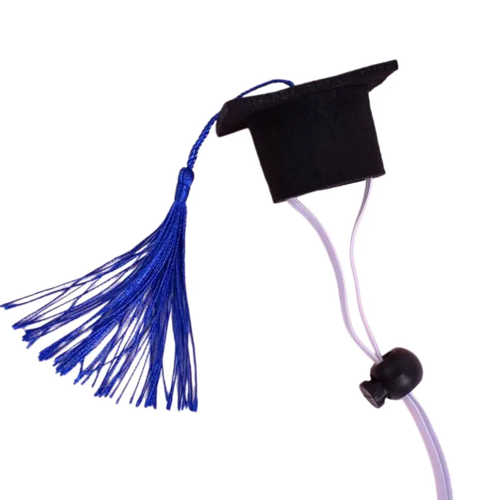 Detailed product view of the adjustable felt pet graduation hat with a royal blue tassel on a white background.