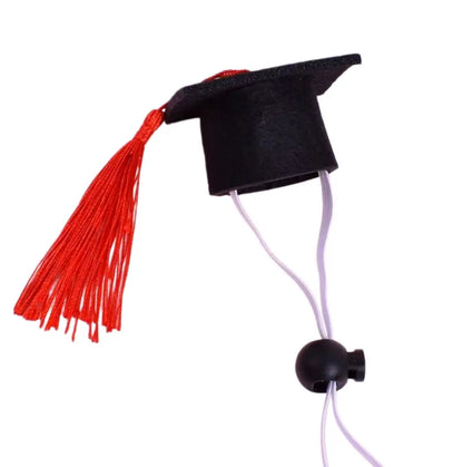 Detailed product view of the adjustable felt pet graduation hat with a royal blue tassel on a white background.