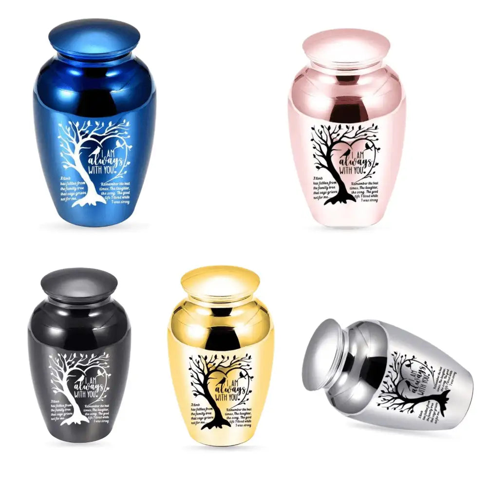 Five colorful options of the perfect memorials pet urns engraved with a tree of life.