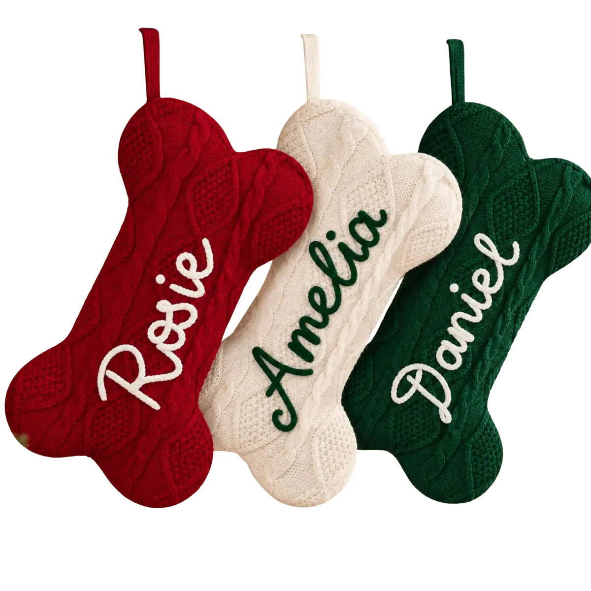 Personalized dog Christmas stockings in red, cream and dark green with embroidered pet names