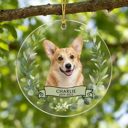 Personalized pet memorial ornament in Style E with a custom dog photo, name and green foliage.