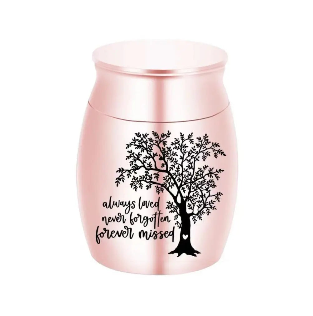 Isolated front view of the pink gold memorial urns for pets engraved with a heart shaped tree of life.