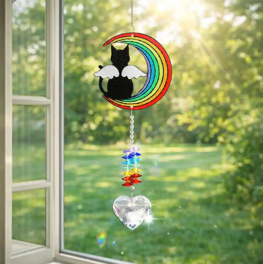 Close-up of the stained glass paw remembrance suncatcher showing colorful mosaic acrylic.
