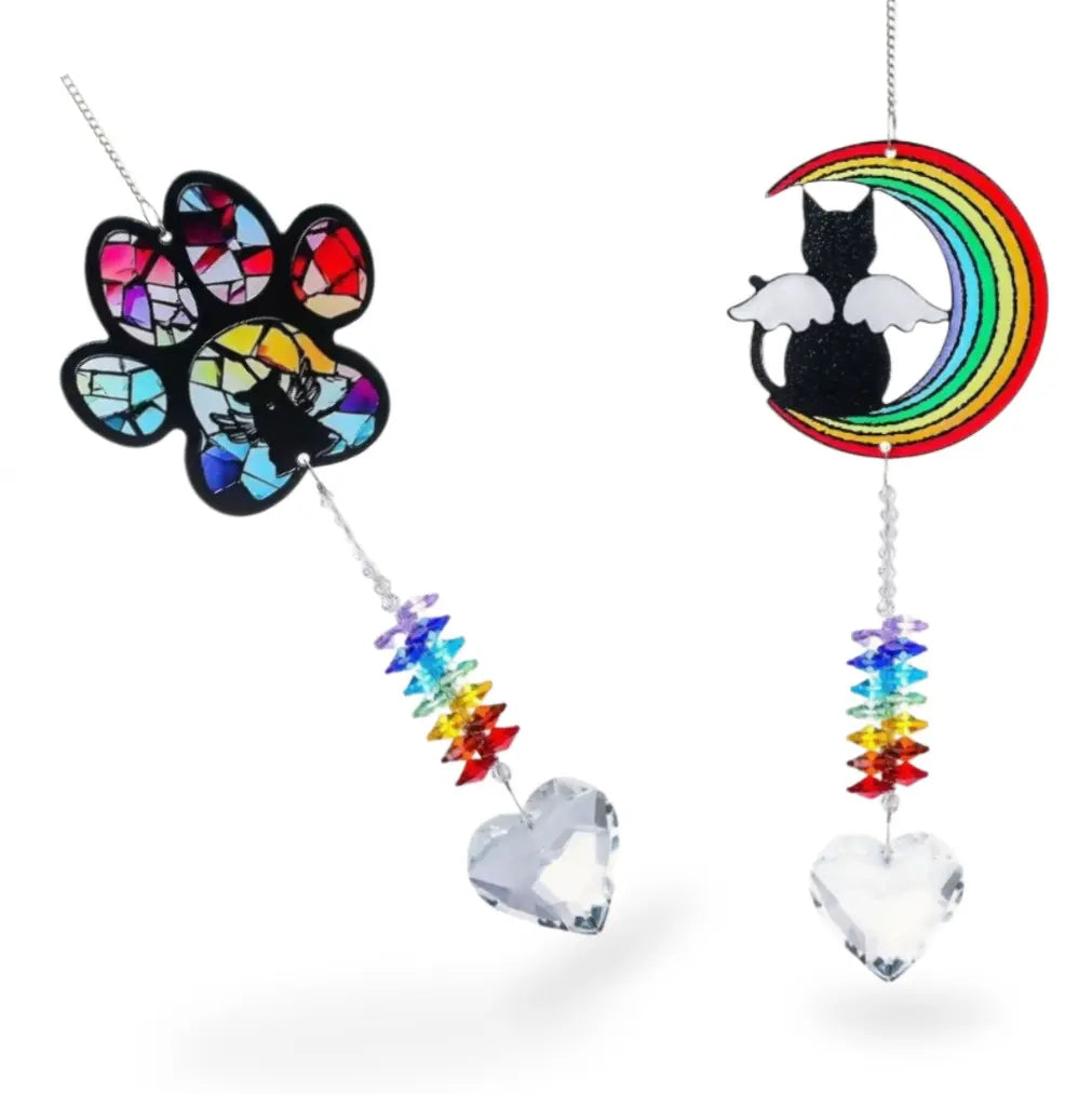Both style variants of the stained glass pet memorial suncatcher showing cat and paw.