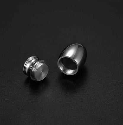 Internal machined threads and secure screw top lid mechanism of the 316L stainless steel micro pet memorial urn.