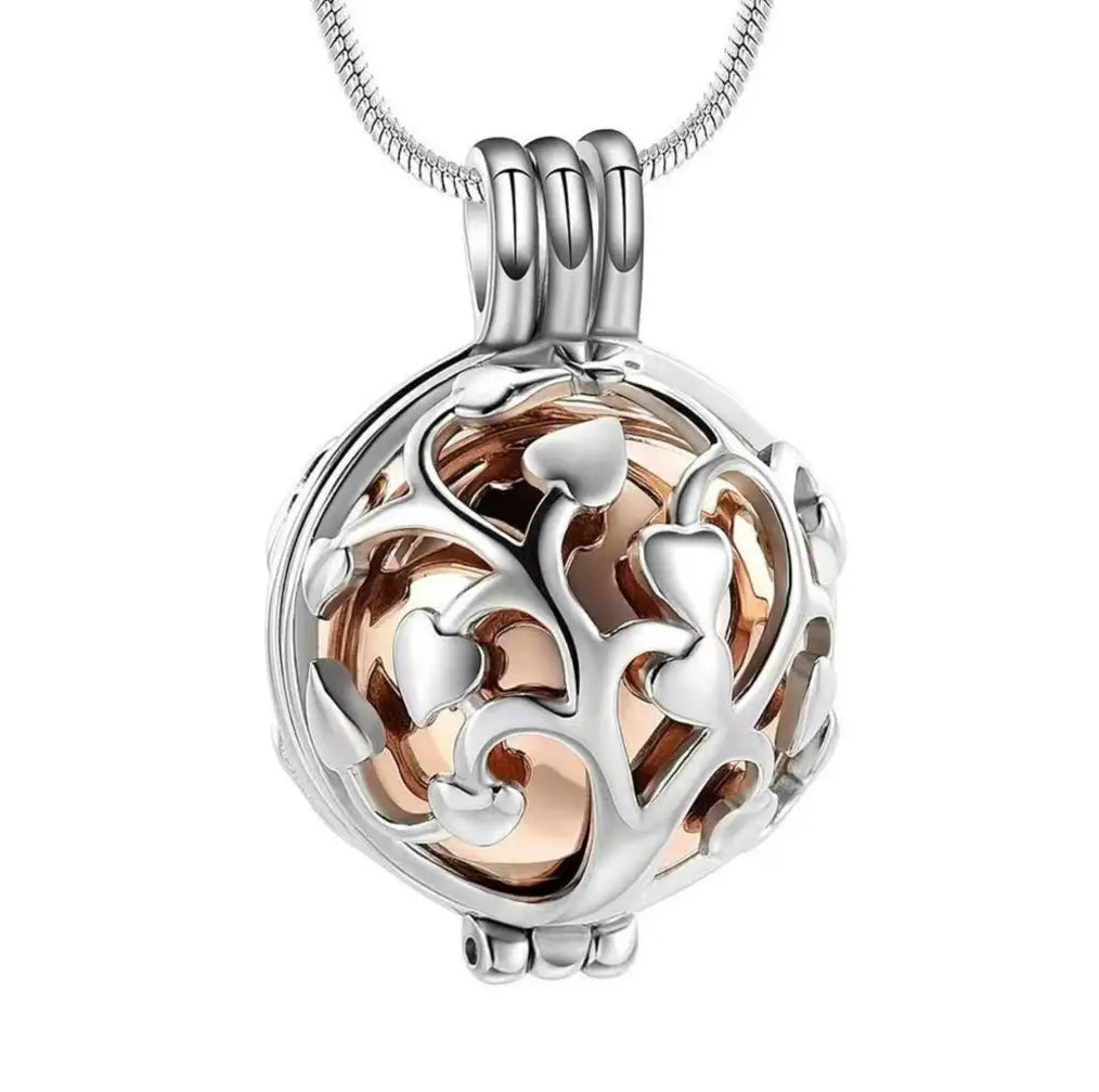 Close-up of the rose-gold Tree of Life pet locket memorial pendant.