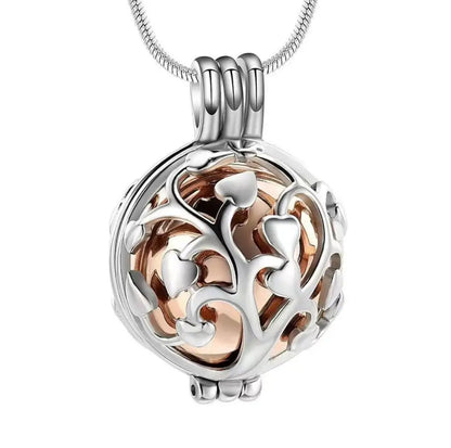 Close-up of the rose-gold Tree of Life pet locket memorial pendant.