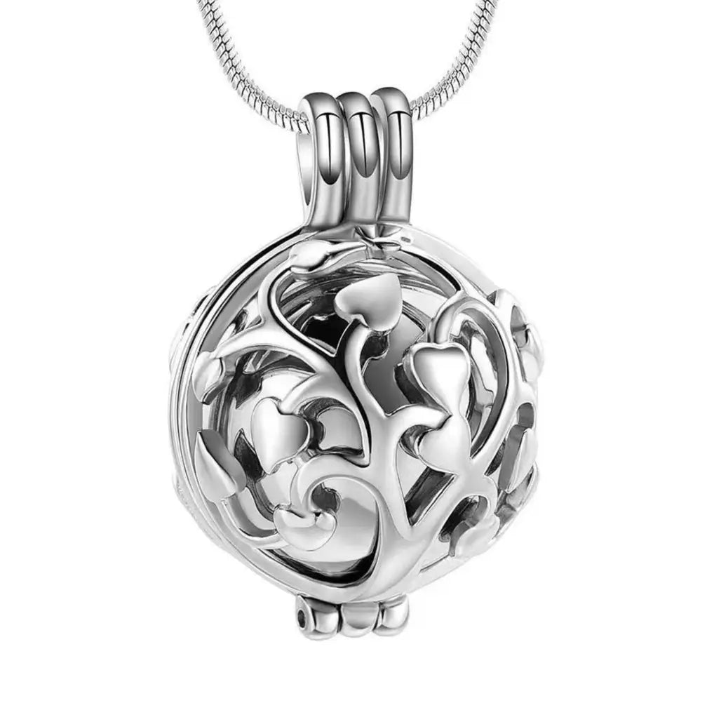 Close-up of the silver Tree of Life pet locket memorial pendant.