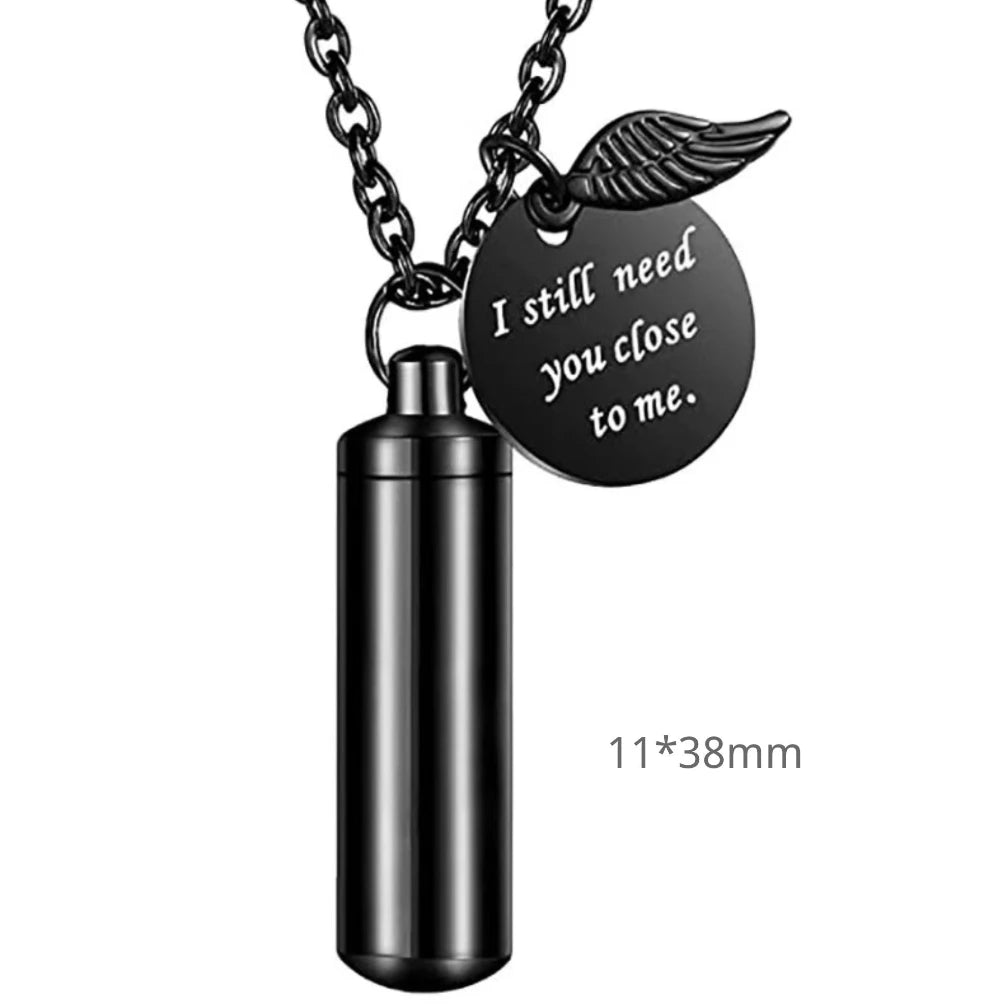 Micro 38mm size variant of the minimalist cylinder pet urn necklace in sleek midnight black.