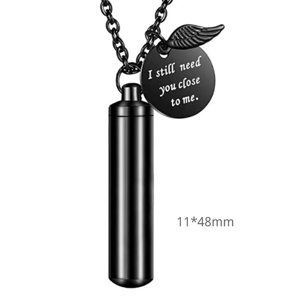 Micro 48mm size variant of the minimalist cylinder pet urn necklace in sleek midnight black.