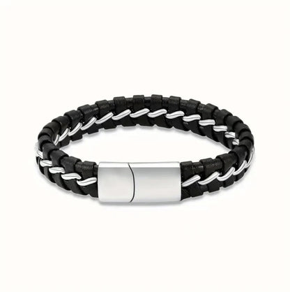 Close-up view of a premium black braided genuine leather pet memorial urn bracelet for ashes featuring a distinctly bold masculine white black stainless steel interlocking clasp.